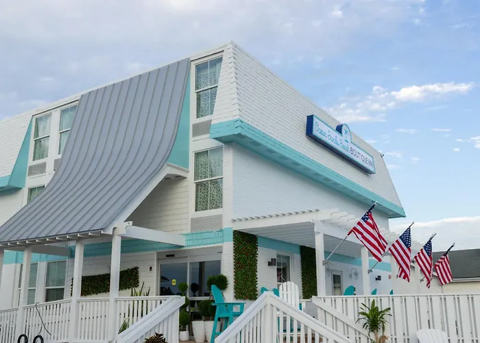 New 2026-Ocean Sands Beach Boutique Inn-Sauna And Salt-Mineral Pool -Free Beach Bikes And Famous Beach- Fresh Baked Cookies And Popcorn - Bathrobes And Sunscreen In All Rooms-Ultra Sparkling-Free Laundry- 4 Grand Black Beds-Call Now & Save-1-252-Aha-